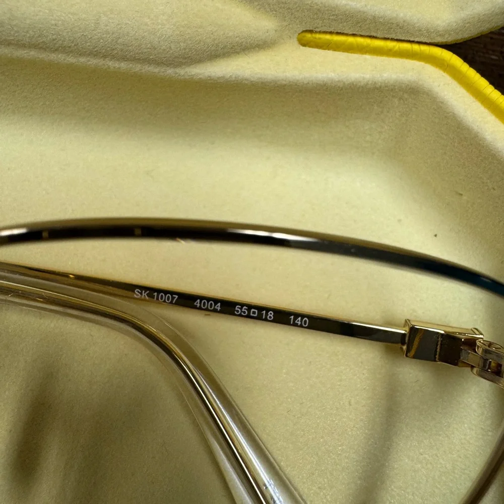 Swarovski Gold Round Glasses with Minimalist Design - Picture 2 of 3